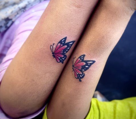 Matching Butterfly Tattoo mother and son