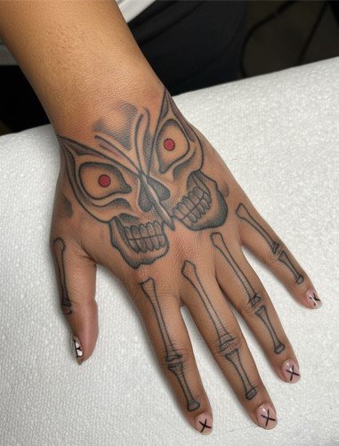 Skeleton Butterfly Hand Tattoo