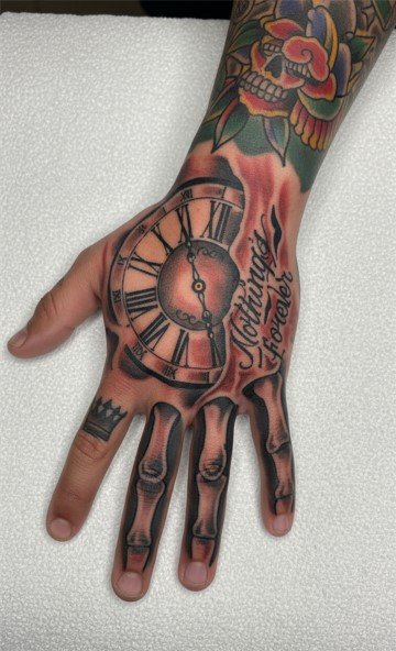 half clock skeleton hand tattoo